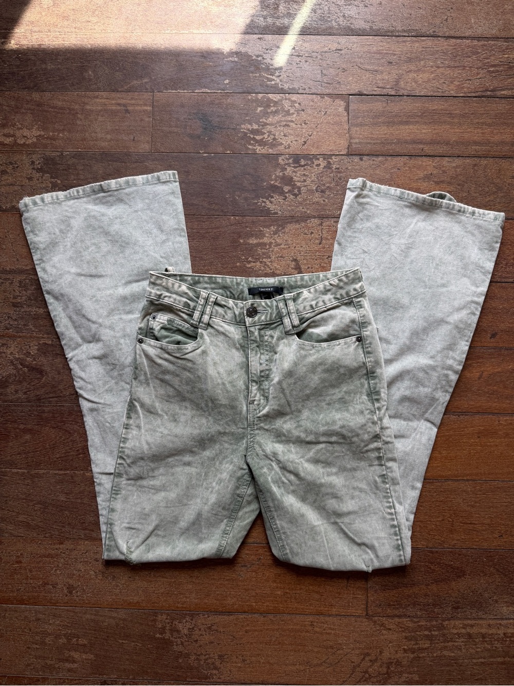 Light green acid wash flare jeans